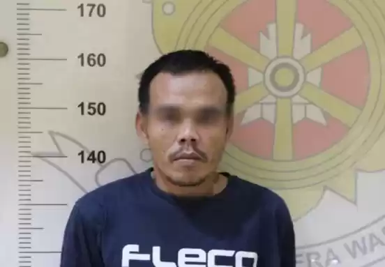 Pria berinisial WOa yang ditangkap polisi di sebuah indekos di Tamansari. (Foto: Antara)