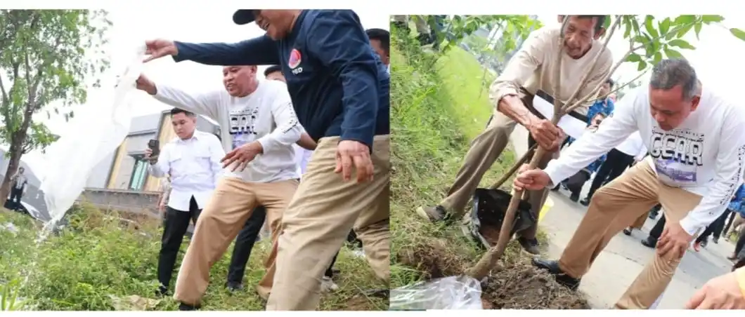 Wali Kota Bekasi sedang menanam pohon dan tabur benih ikan di danau VIP (Foto: Dikopin)